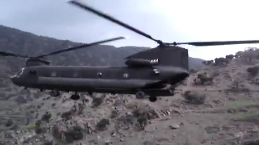 View the Video: An unknown CH-47D Chinook helicopter extracts grounds troops at an unknown location.