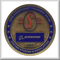 The back side of a coin issued to the members of the CH-47F New Equipment Training Team (NETT). Click-N-Go to view a larger image.
