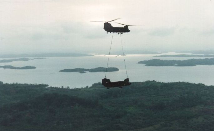 One CH-47D rescues another in Panama.