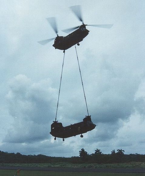 One CH-47D rescues another in Panama.