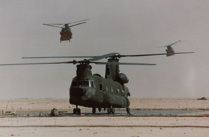 Three Boeing CH-47D's thirsty for fuel in the desert of Saudi Arabia.