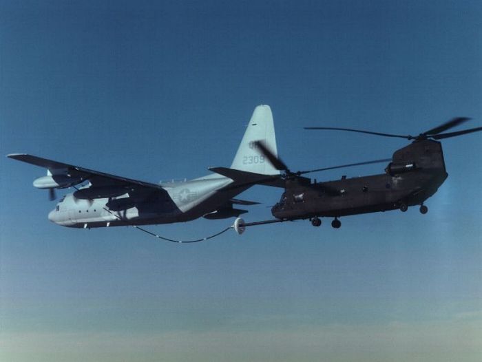 Boeing MH-47D helicopter conducting inflight refueling.