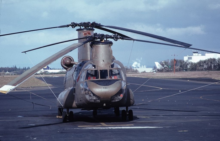 May 1982: CH-47A Chinook helicopter 65-07991 is seen resting on the ramp at Paine Field (KPAE), Everett, Washington. At the time, 65-07991 was property of the 92nd Aviation Company - "Hook-ers", United States Army Reserve (USAR).