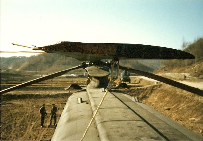 CH-47C Chinook helicopter 67-18532 in a field site in the Republic of Korea (South Korea) after a wire strike incident that occured on 9 December 1985.