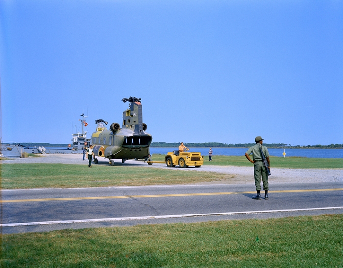 1973: An aircraft tug pulls CH-47C Chinook helicopter 67-18542 away from a barge during the move to Langley Air Force Base, Virginia. The aircraft was transported from Fort Eustis, Virgina, and was destined for destruction as part of the crash testing conducted in support of the U.S. Army by the National Aeronautics and Space Administration (NASA).