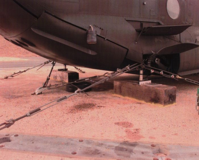 84-24156 at Aberdeen Proving Grounds. This photograph shows how the aircraft was secured to the planet in preparation for the ground run tests, date unknown.