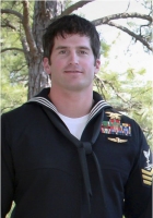 Special Warfare Operator Petty Officer 1st Class (SEAL/Enlisted Surface Warfare Specialist) Jon T. Tumilson, 35, of Rockford, Iowa.