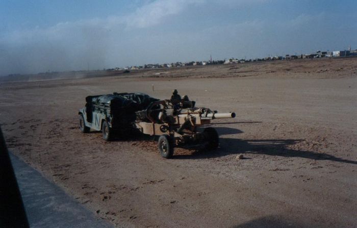A load for 85-24335 - an 82nd Airborne Division Humvee and 105 mm Howizter, during Operation Desert Shield / Storm, circa 1990-1991.