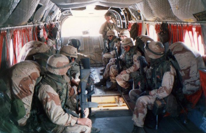 Members of the 82 Airborne Division gun crew on board 85-24335 headed to FOB Cobra, during Operation Desert Shield / Storm, circa 1990-1991.