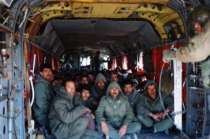 Iraqi Enemy Prisoners of War on board 85-24335 During Operation Desert Storm, circa 1991.