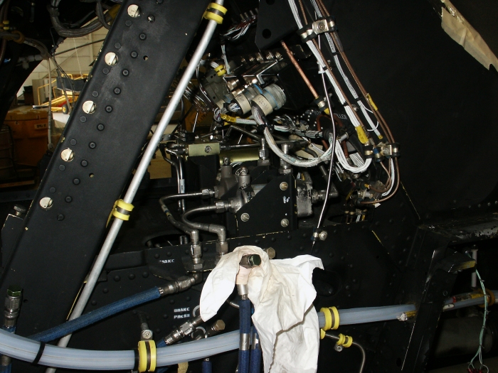 The left chin bubble area of CH-47D Chinook helicopter 85-24336 showing the brake transfer valves.