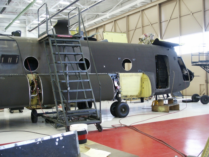 The right exterior area of CH-47D Chinook helicopter 85-24336 showing the right forward auxiliary fuel tank removed.