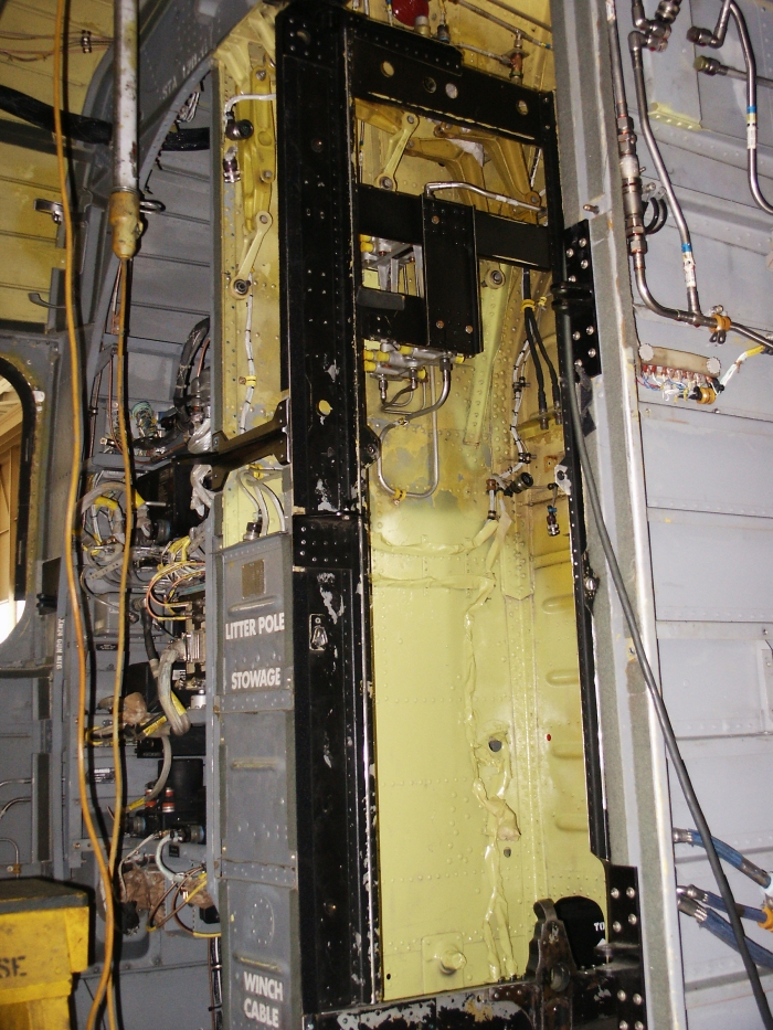 The flight control closet of CH-47D Chinook helicopter 85-24336 with most of the components are removed.