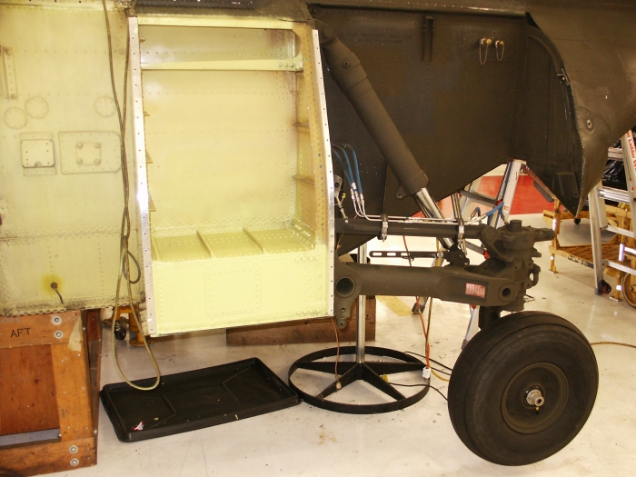 The left aft compartment and the left aft landing gear of CH-47D Chinook helicopter 85-24336.