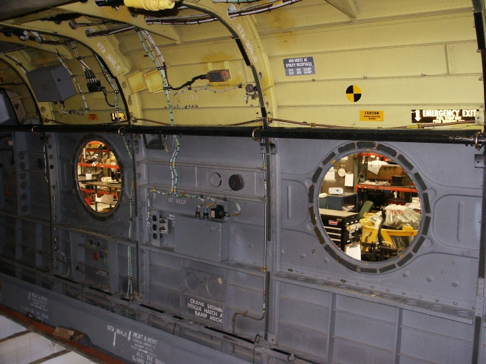 The left main cabin area of CH-47D Chinook helicopter 85-24336 showing the fuel relay control box.