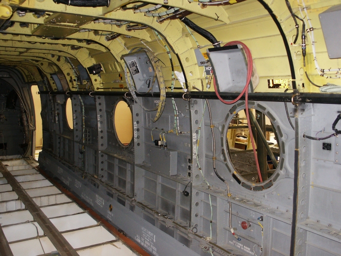 The right inside cabin area of CH-47D Chinook helicopter 85-24336 showing the right side fuel control relay control unit and the power supply for the refueling station.