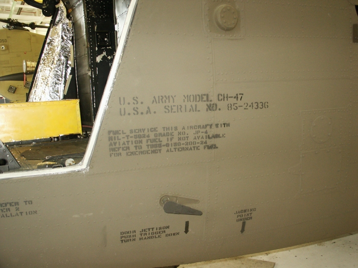 Visible on the left forward fuselage just aft of the copilot's door is the painted on serial number of CH-47D Chinook helicopter 85-24336.