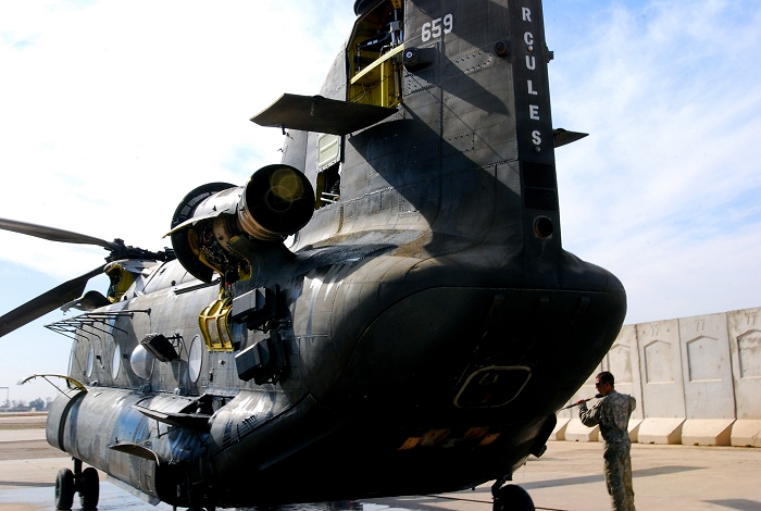 17 February 2008: CH-47D Chinook helicopter 86-01659 gets some tender loving care at Camp Striker, Iraq.
