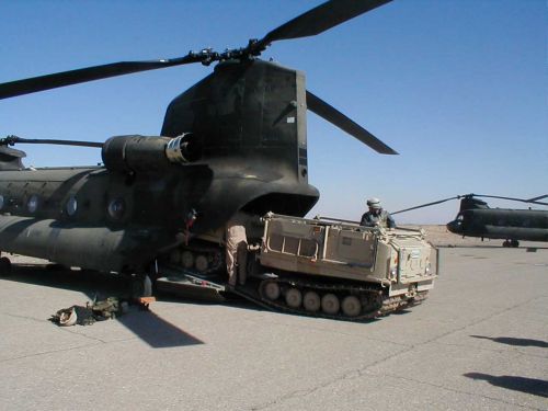 86-01669 in Afghanistan practicing cargo loading maneuvers.