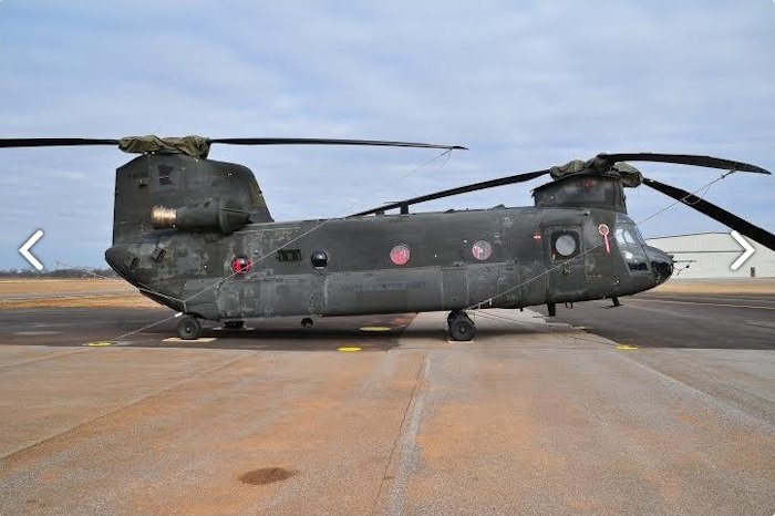 CH-47D Chinook helicopter 86-01682 resting on the ramp at Madison Executive Airport (KMDQ), Meridianville, Alabama, during the auction process as it went up for sale to the highest bidder on the commercial market.