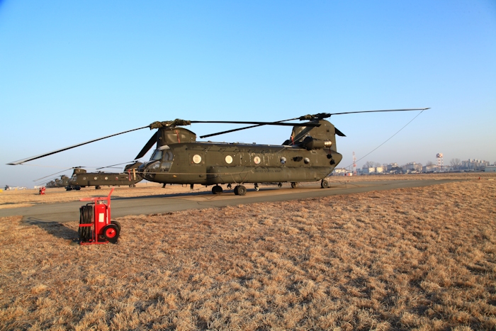 20 February 2014: 88-00096 resting on the ramp at Desiderio Army Airfield (RKSG or A-511), Camp Humphreys, Republic of Korea, as the D model fleet assigned to B Company - "Innkeepers", 3rd Battalion, 2nd Aviation Regiment, undergoes a Foreign Military Sale (FMS) to the Republic of Korea. The Korean government purchased the 14 aircraft assigned to the Innkeepers for approximately $3,900,000 each as is, with five spare GA-714A engines and some various parts.
