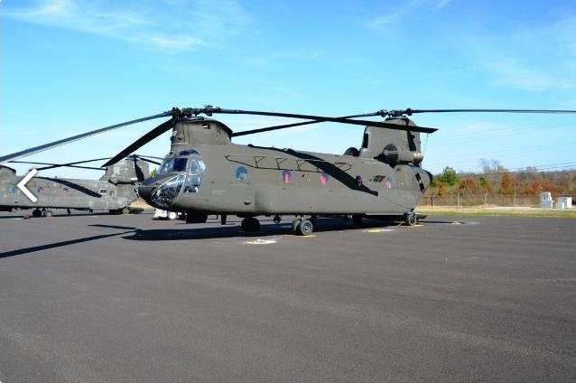 A left front view of CH-47D Chinook helicopter 88-00097 sitting at Madison Executive Airport (KMDQ), Meridianville, Alabama, during the auction process as it went up for sale to the highest bidder on the commercial market.