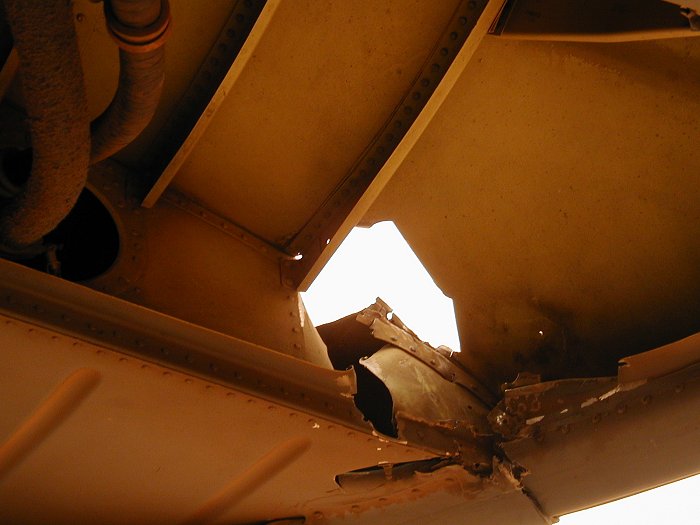 An interior view of 88-00099 and the RPG damage.