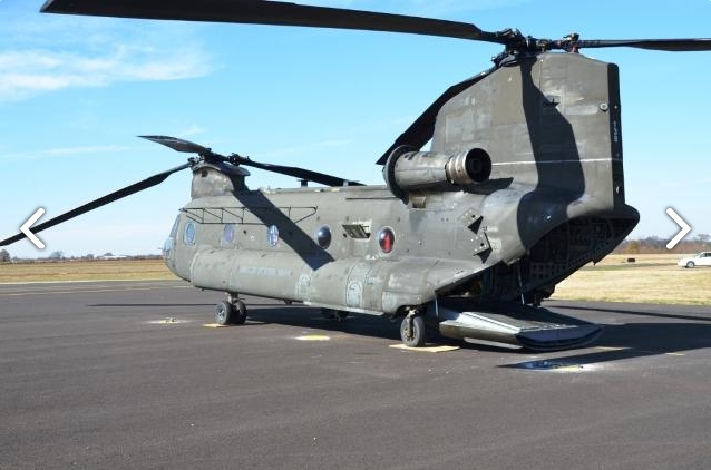 A left rear view of CH-47D Chinook helicopter 89-00138 as it sat at Madison Executive Airport (KMDQ), Meridianville, Alabama, during the auction process as it went up for sale to the highest bidder on the commercial market.