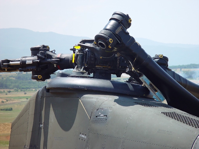 July 2002: Without the droop stops engaged and the dampner firmly attached, an aft rotor blade will make contact with the fuselage during engine shutdown and cause extensive damage.