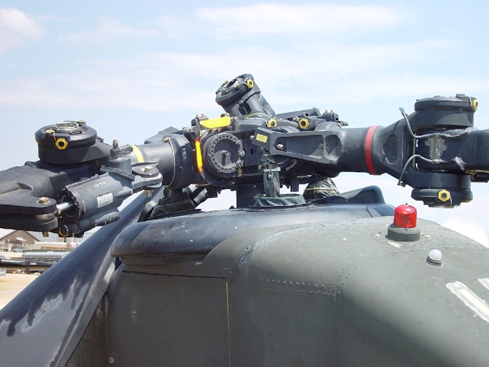 July 2002: Without the droop stops engaged and the dampner firmly attached, an aft rotor blade will make contact with the fuselage during engine shutdown and cause extensive damage.