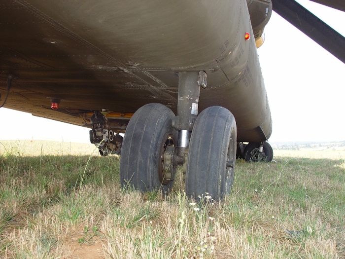 July 2002: A view of the left forward landing gear. The center cargo hook and the lower anti-collision light can also be seen in this image.