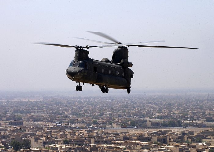 90-00211, a U.S. Army CH-47D helicopter belonging to Company A - "Hook-ers", 5th Battalion, 159th Aviation Regiment, United States Army Reserve home-based at Fort Lewis, Washington, flies over Baghdad, Iraq, during a distinguished visitor flight in support of Operation Iraqi Freedom.