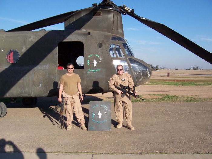 90-00211, painted as "Livin' Large" by the main cabin door. Note also the sheet metal painted in the same fashion between the two crew members. The sheet metal came from an ex-Iranian Chinook, Augusta build P-043, captured by the Iraqi's during the Iran-Iraq war.