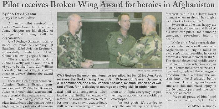 CW3 Rodney Swanson recieves a "Broken Wing" award.