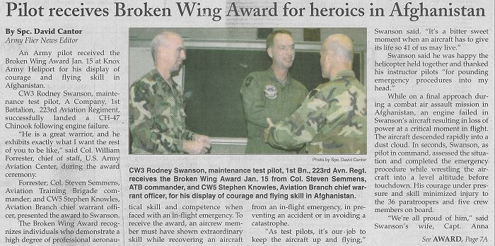 CW3 Rodney Swanson recieves a "Broken Wing" award.