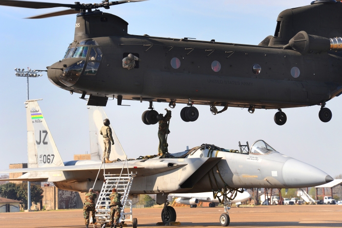 4 March 2009: An F-15 "Strike Eagle" static display aircraft is airlifted to Camp Beauregard. Louisiana Army National Guard, Air National Guard and Mississippi Army National Guardsmen joined forces to accomplish an impressive mission that involved CH-47D Chinook helicopter 91-00265 sling loading an F-15 static display from England Air Park to Camp Beauregard.
