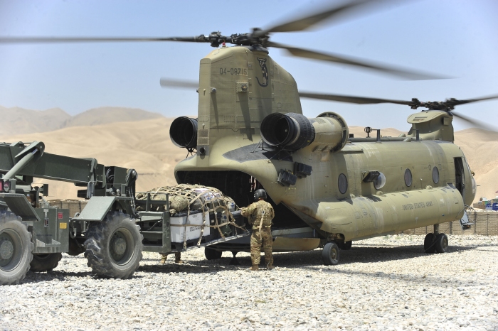 CH-47F Chinook helicopter 04-08715 loading cargo at Operating Post (OP) North in Afghanistan.
