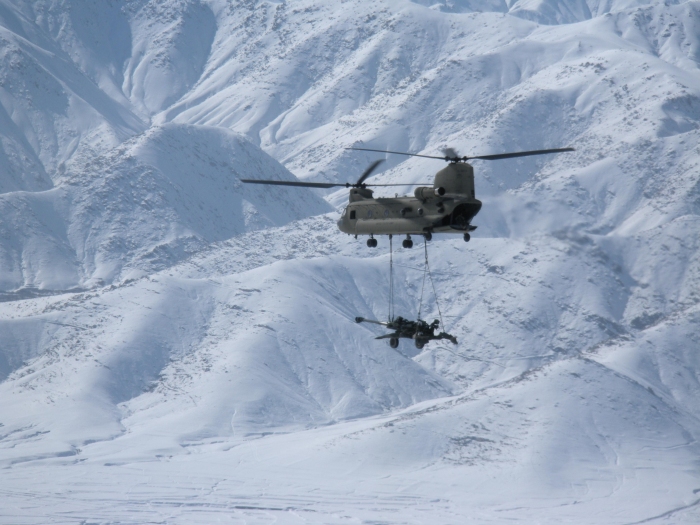 Early 2009: CH-47F Chinook helicopter 05-08014 operating at an unknown location in Afghanistan while sling loading an M198 155mm Howitzer.
