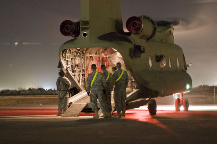 20 May 2009. CAMP TAJI, Iraq: Under the cover of night, Soldiers from the 1st Air Cavalry Brigade, 1st Cavalry Division, Multi-National Division - Baghdad, arrive at Camp Taji, Iraq for their year-long deployment in support of Operation Iraqi Freedom. Soldiers flew in on a CH-47F Chinook helicopter assigned to Company B, 2nd Battalion, 4th Aviation Regiment, Combat Aviation Brigade, 4th Infantry Division, home stationed at Fort Hood, Texas.