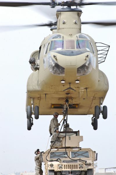 March 2009: 06-08023, a CH-47F Chinook cargo helicopter from the 2nd Battalion, 4th Combat Aviation Brigade, 4th Infantry Division, Multi-National Division - Baghdad, lifts a humvee off the ground during a sling load certification course at Camp Taji, Iraq. The training was intended to provide Soldiers with the essential skills necessary for sling loading equipment and supplies with a Chinook - the U.S. Army's premiere heavy lift aircraft.