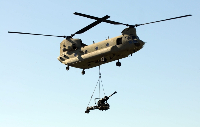 17 November 2011: While practicing an air assault raid, 06-08720 transports a 105 mm M119 Howitzer at Pick-up Zone Ash on the range at Fort Campbell, Kentucky, during a training exercise in support of cannoneers from Battery A, 2nd Battalion, 320th Field Artillery, 1st Brigade Combat Team.