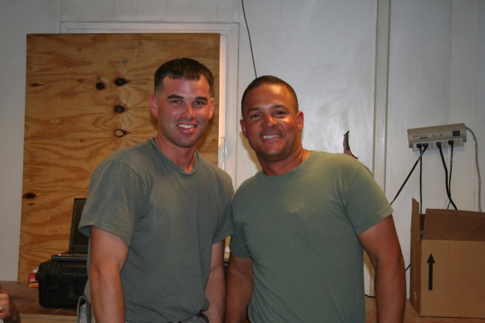 August 2009: SGT Francisco Rodriguez, Flight Engineer, and SPC Julio Acevedo, Crew Chief, on 07-08039 while deployed to Afghanistan.