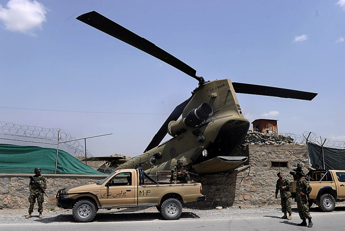 26 July 2010: Afghan National Army (ANA) soldiers stand guard alongside International Security Assistance Force (ISAF) CH-47F Chinook helicopter 08-08048 which crashed in an eastern district of Kabul yesterday. The aircraft made a hard landing along the perimeter of a coalition force camp in Kabul province. Four passengers received minor injuries. The cause of the crash is under investigation.