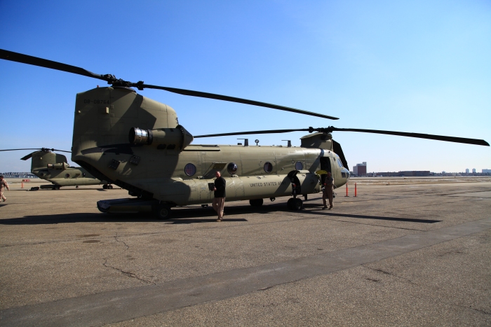 16 April 2012: NET Team Director of Flight Operations (left) and Flight Engineer Rob Simpson conduct post-flight checks on 08-08764 after arriving at Edmonton City Center Airport in Edmonton, Alberta, Canada. The aircraft heater (located right side and just aft of the cockpit) spit unburnt fuel down the side of the fuselage all the way to the ramp during the flight and left a nasty mess. JP-8 fuel simply does not perform as well as JP-4 does. It stinks, is oily, causes fowling of the heater spark plug (which will shut the heater down mid-flight and it cannot be restarted) and, more often than not, causes a plume of white smoke (mostly unburnt fuel) to be vented from the exhaust stack. Occassionally, the smoke will ignite and a fireball will be ejected out the exhaust vent. Never had any of these issues with JP-4. Unfortunately, JP-8 is widely used in the U.S. Military and universally hated by Chinook flight crews. JP-4 is a rare, but welcomed find for Hookers.