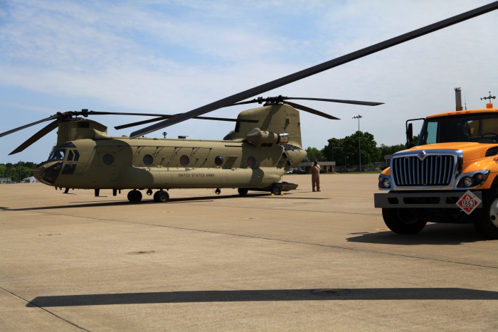 10 April 2012: Rich Davis III stands behind CH-47F Chinook helicopter 08-08764 on the ramp at Campbell Airfield, Fort Campbell, Kentucky, during a full stop.