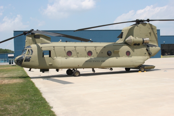 6 August 2010: CH-47F Chinook helicopter 09-08064 sitting on the ramp awaiting a student training flight at Millville Airport (KMIV), New Jersey.