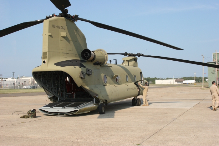 9 August 2010: CH-47F Chinook helicopter 09-08065 sits parked on the taxiway near the Boeing Modification Center at Millville Airport (KMIV), New Jersey. The aircraft and crew had just finished refueling after conducting an Aircraft Qualification Course training flight.
