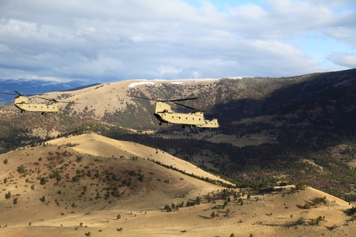 16 April 2012: Photographed from 08-08771, elements of Sortie 1 (08-08764, 10-08082 and 10-08082) are shown passing the Sleeping Man formation about 10 miles north of Helena, Montana.