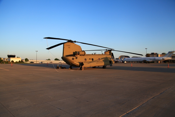 11 April 2012: Flight Engineer Doug Grade prepares CH-47F Chinook helicopter 10-08083 for an early morning flight from Spirit of St. Louis Airport (KSUS) to Sioux City (KSUX), Iowa.