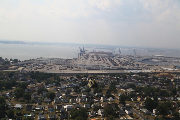 11 September 2013: CH-47F Chinook helicopter 11-08834 on final approach to the dock at the Port of Baltimore. Already on the ground are 11-08841 and 12-08104 while 11-08838 remains in chalk four snapping photographs.